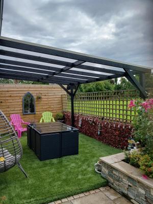 Pergola and artificial grass from  Badges