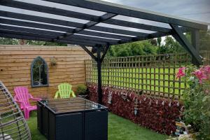 Pergola and artificial grass from project LANDSCAPING. PERGOLA